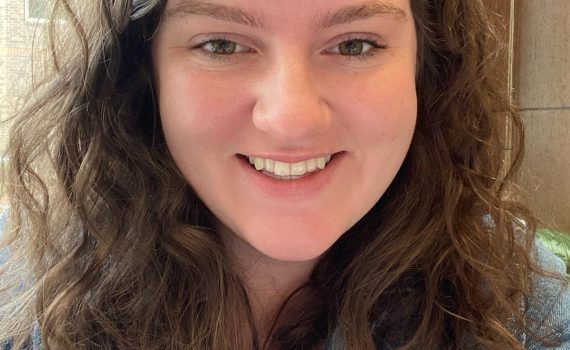 ITEHP student, Tenley Weil, smiling and wearing a jean jacket