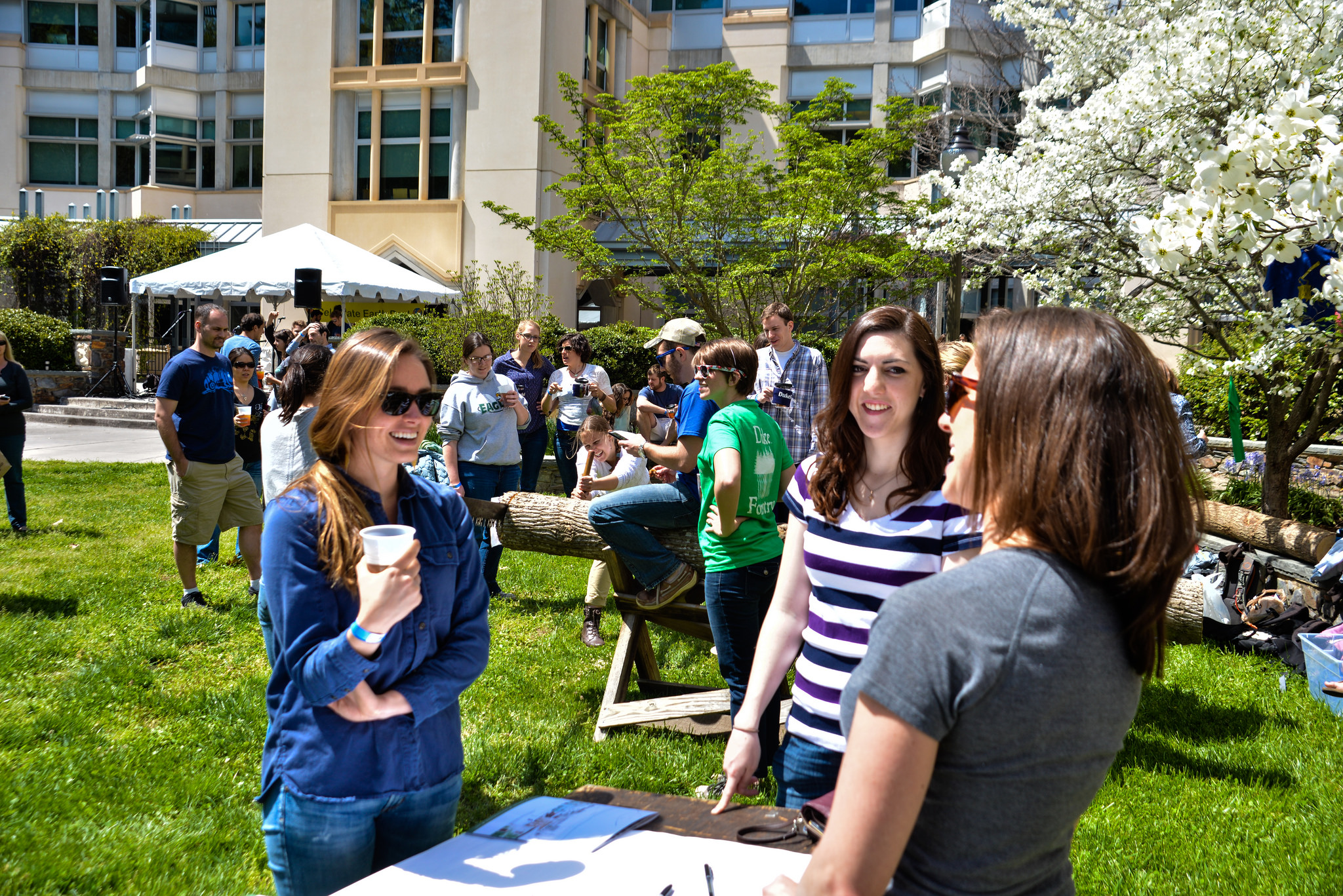students on lawn during Earth Day celebration