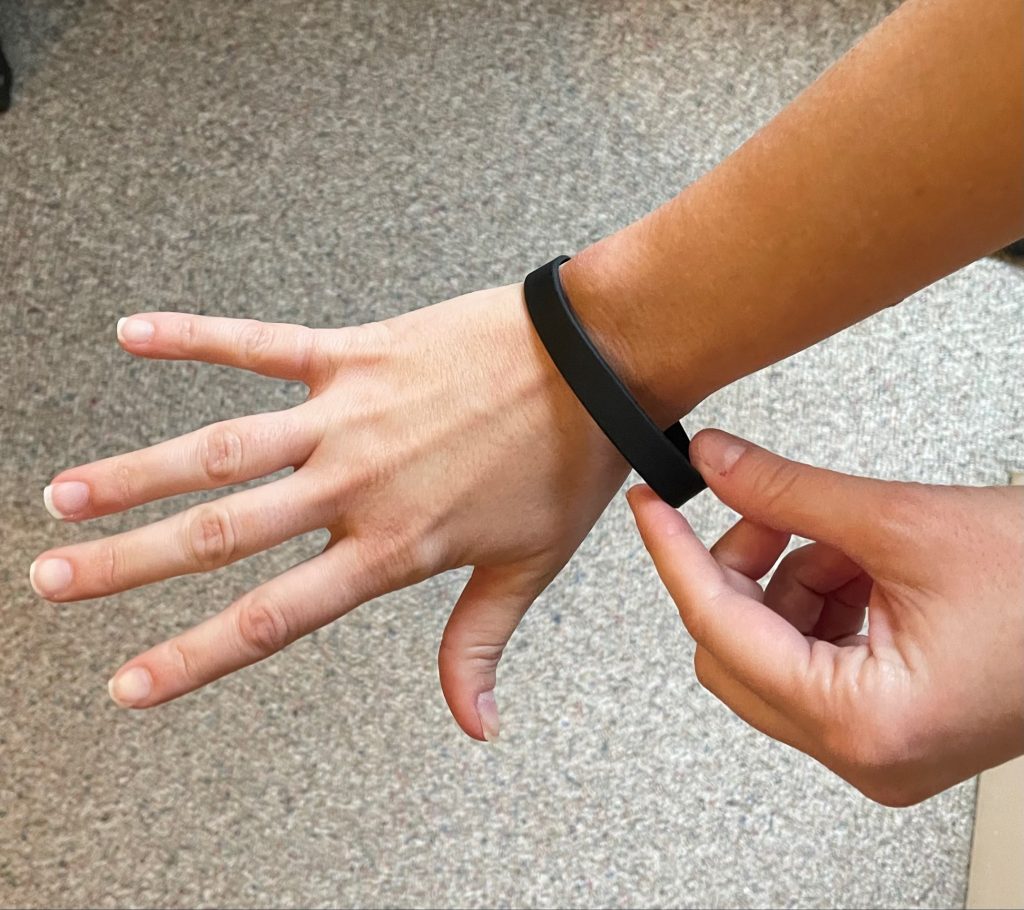 A silicone wristband as worn for research.